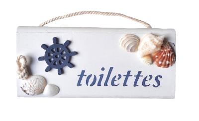 Plaque toilettes bord de mer